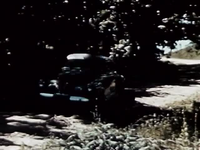 Car Climbing the Sandy Hill