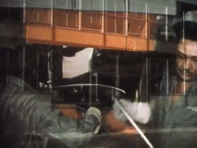 Rail Worker at the Machine